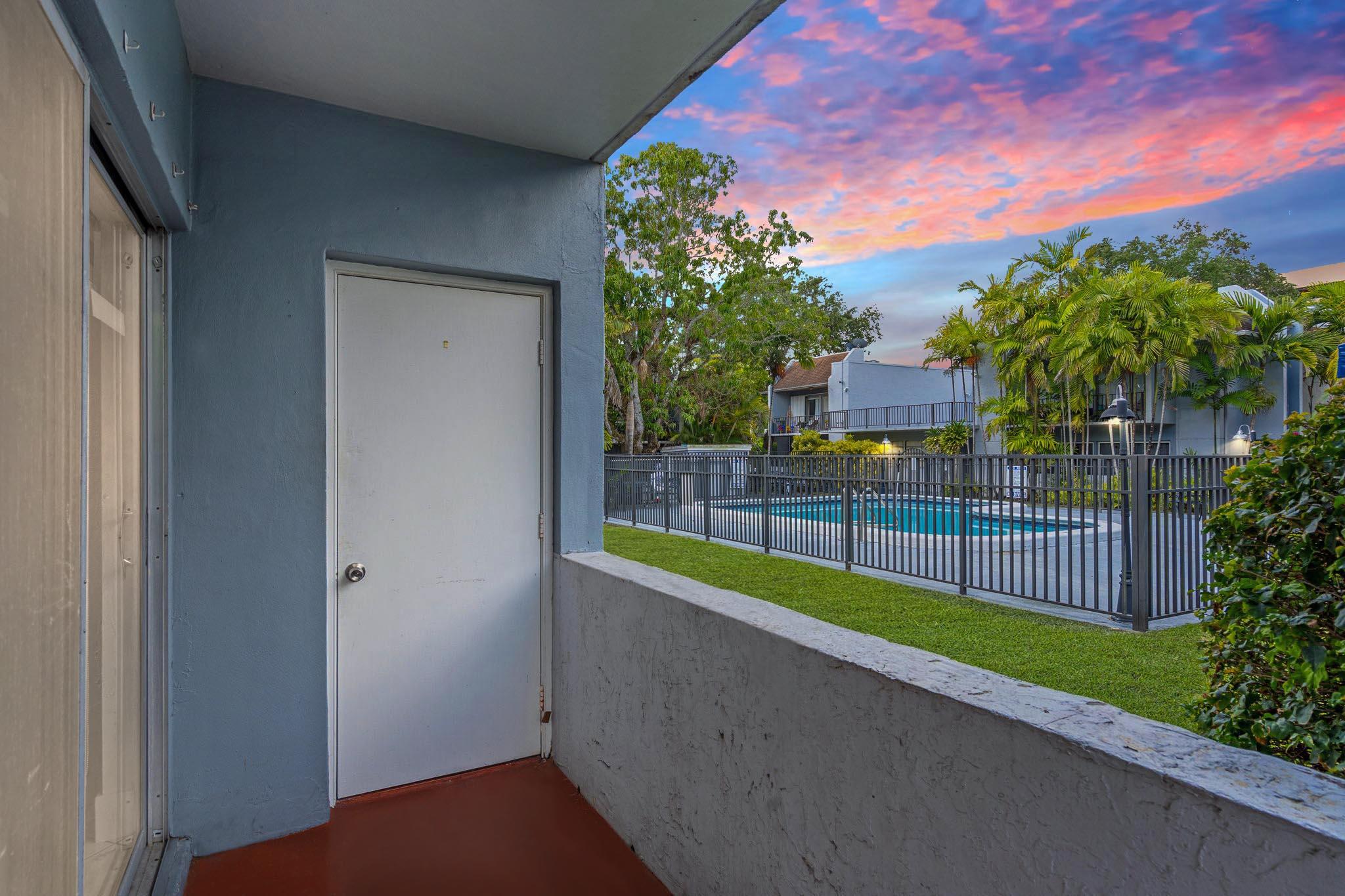 9227 Southwest 87th Avenue, Unit B1 Miami, FL 33176 - Photo 3 of 27 a view of a backyard with a small yard