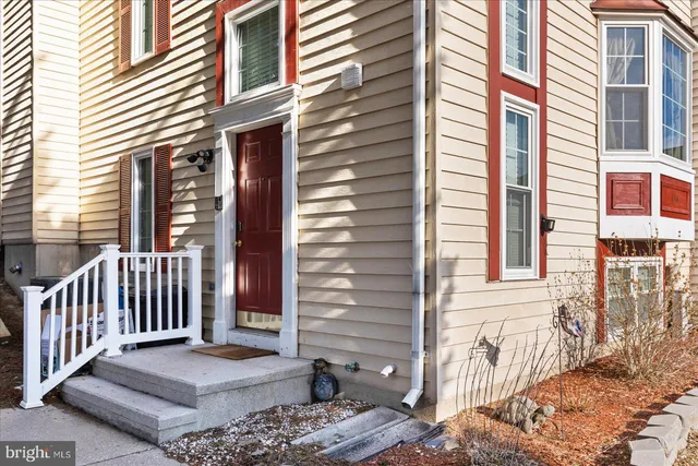 a view of a brick building with many windows