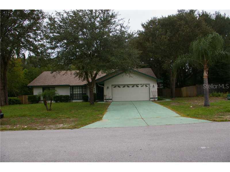 960 Ridgegreen Loop North Lakeland, FL 33809 - Photo 1 of 1 Exterior Front - Privacy fence also showing on the sides of the house