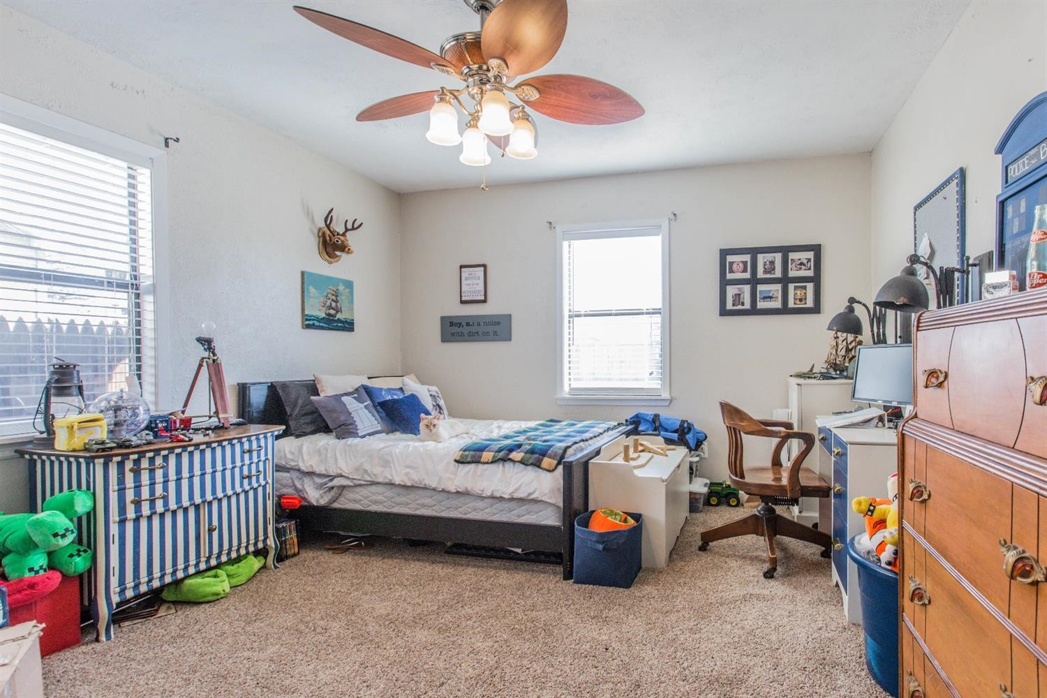 2806 30th Street Lubbock, TX 79410 - Photo 7 of 10 a bedroom with bed and a window