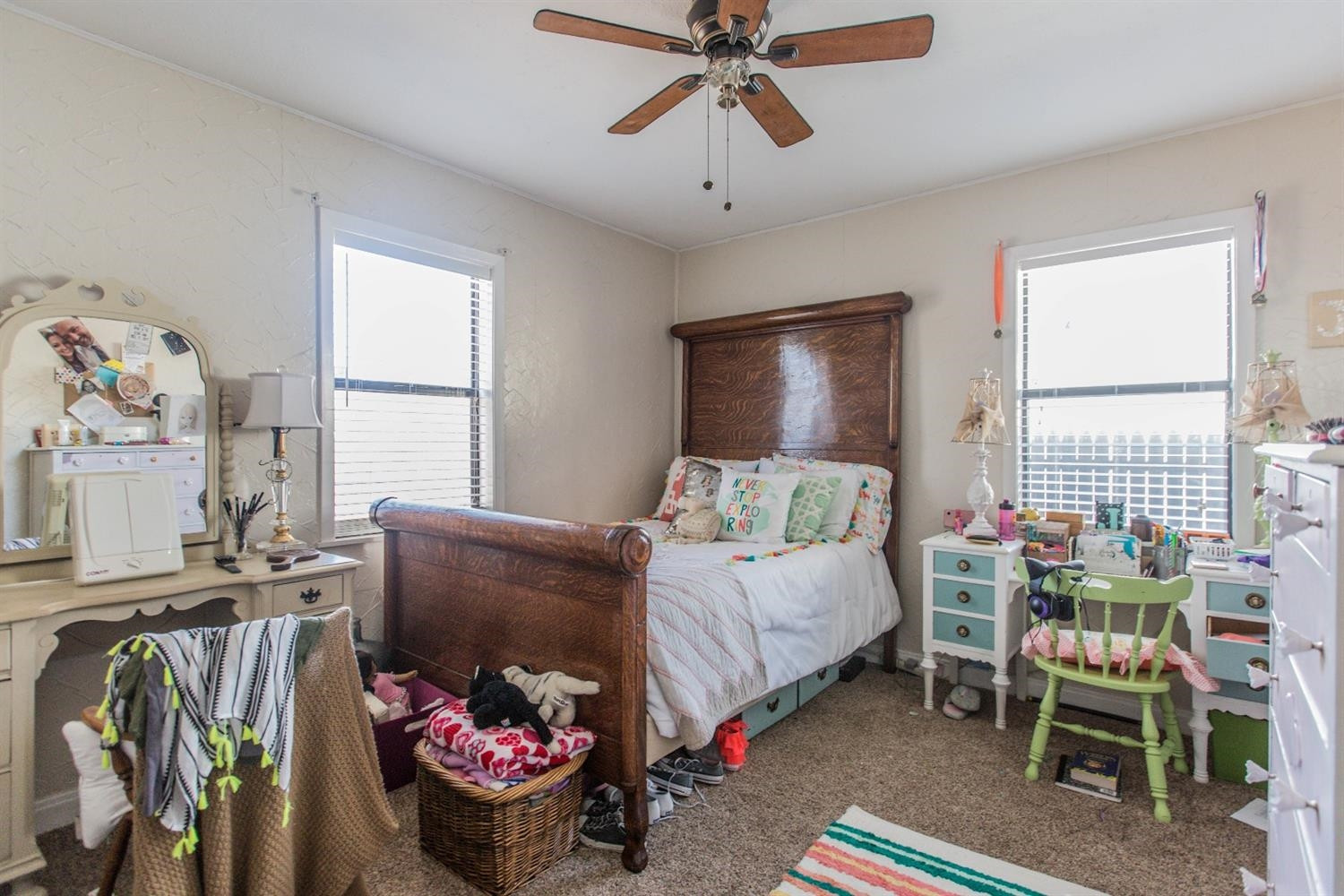 2806 30th Street Lubbock, TX 79410 - Photo 9 of 10 a bedroom with furniture and a bed
