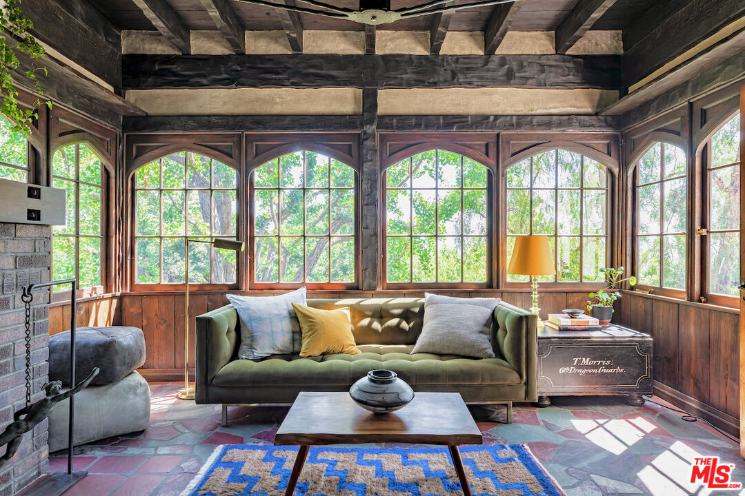 3701 Shannon Road Los Angeles, CA 90027 - Photo 15 of 54 a living room with furniture and a large window