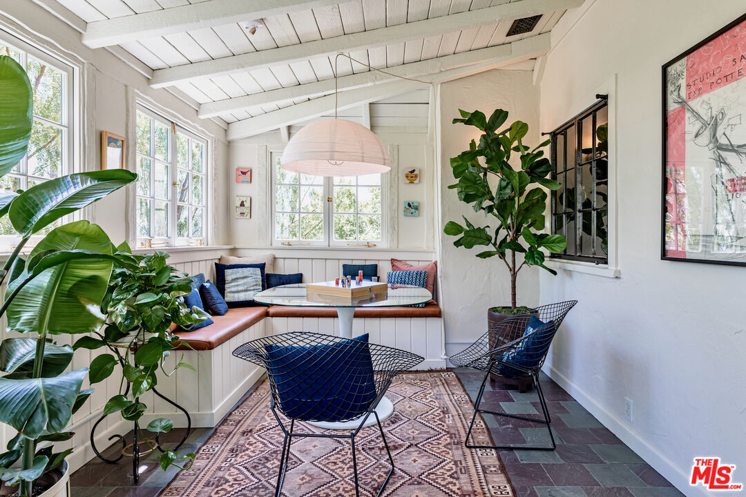 3701 Shannon Road Los Angeles, CA 90027 - Photo 27 of 54 a living room filled with furniture and a potted plant