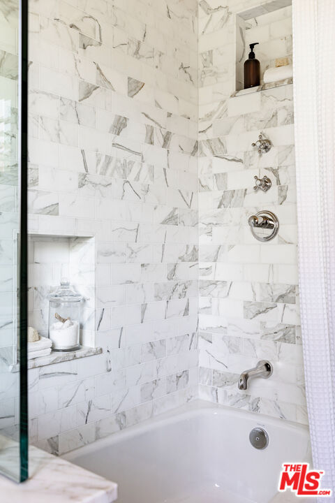 3701 Shannon Road Los Angeles, CA 90027 - Photo 30 of 54 a bathroom with a bathtub and shower
