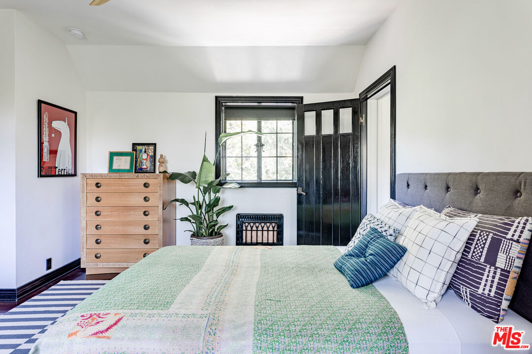 3701 Shannon Road Los Angeles, CA 90027 - Photo 31 of 54 a bed room with a bed and a dresser