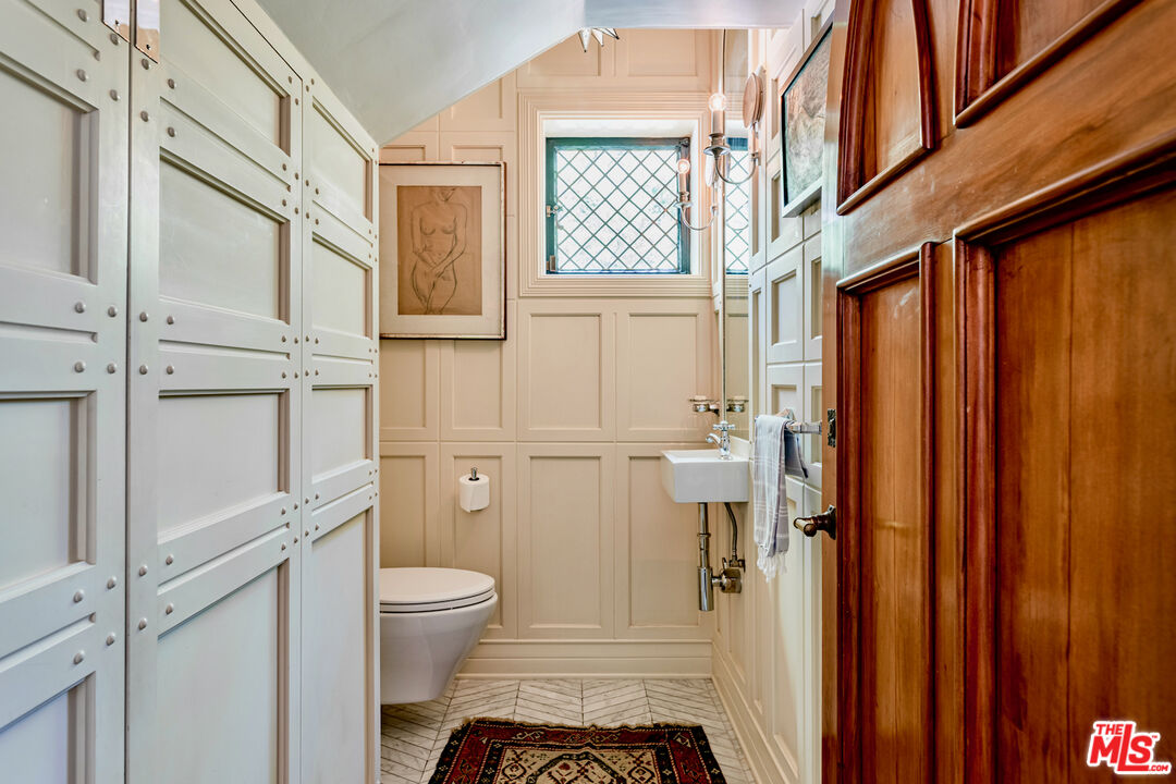 3701 Shannon Road Los Angeles, CA 90027 - Photo 34 of 54 a bathroom with a sink toilet and shower