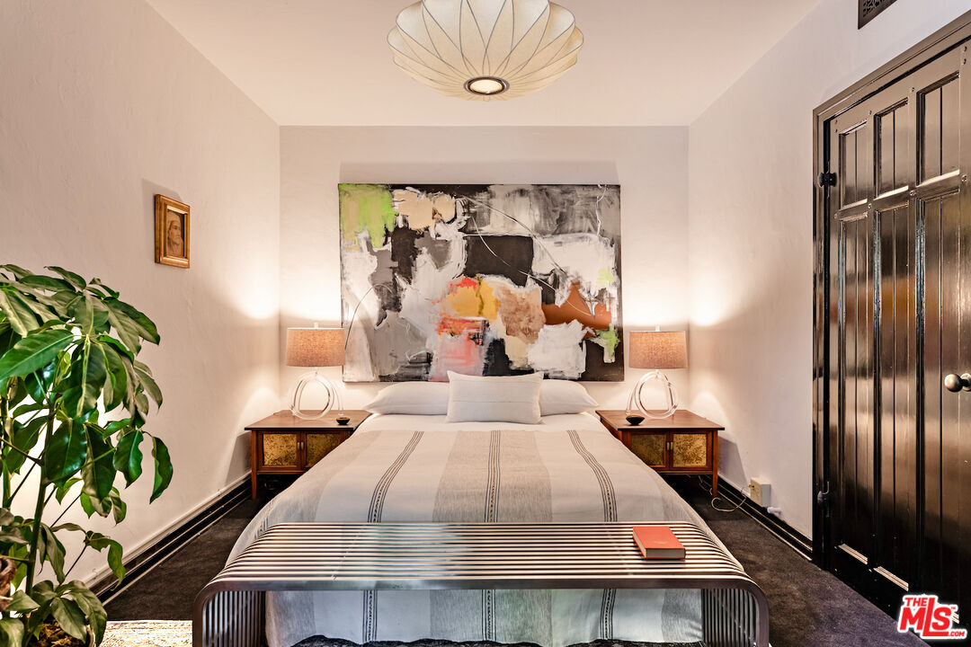 3701 Shannon Road Los Angeles, CA 90027 - Photo 35 of 54 a living room with furniture and a potted plant