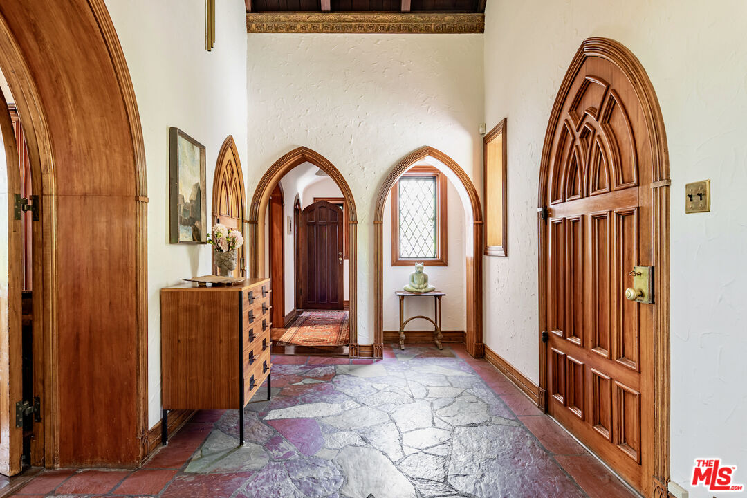 3701 Shannon Road Los Angeles, CA 90027 - Photo 4 of 54 a view of front door with wooden floor