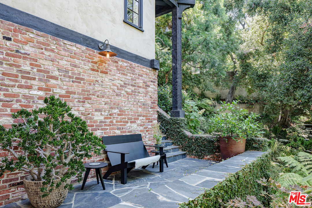 3701 Shannon Road Los Angeles, CA 90027 - Photo 50 of 54 a backyard of a house with outdoor seating