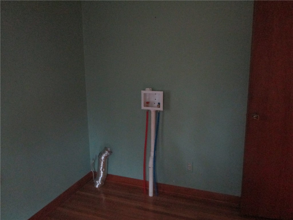 67 Browns Road Wheatland, NY 14546 - Photo 17 of 26 1st floor bedroom with washer & dryer hook ups