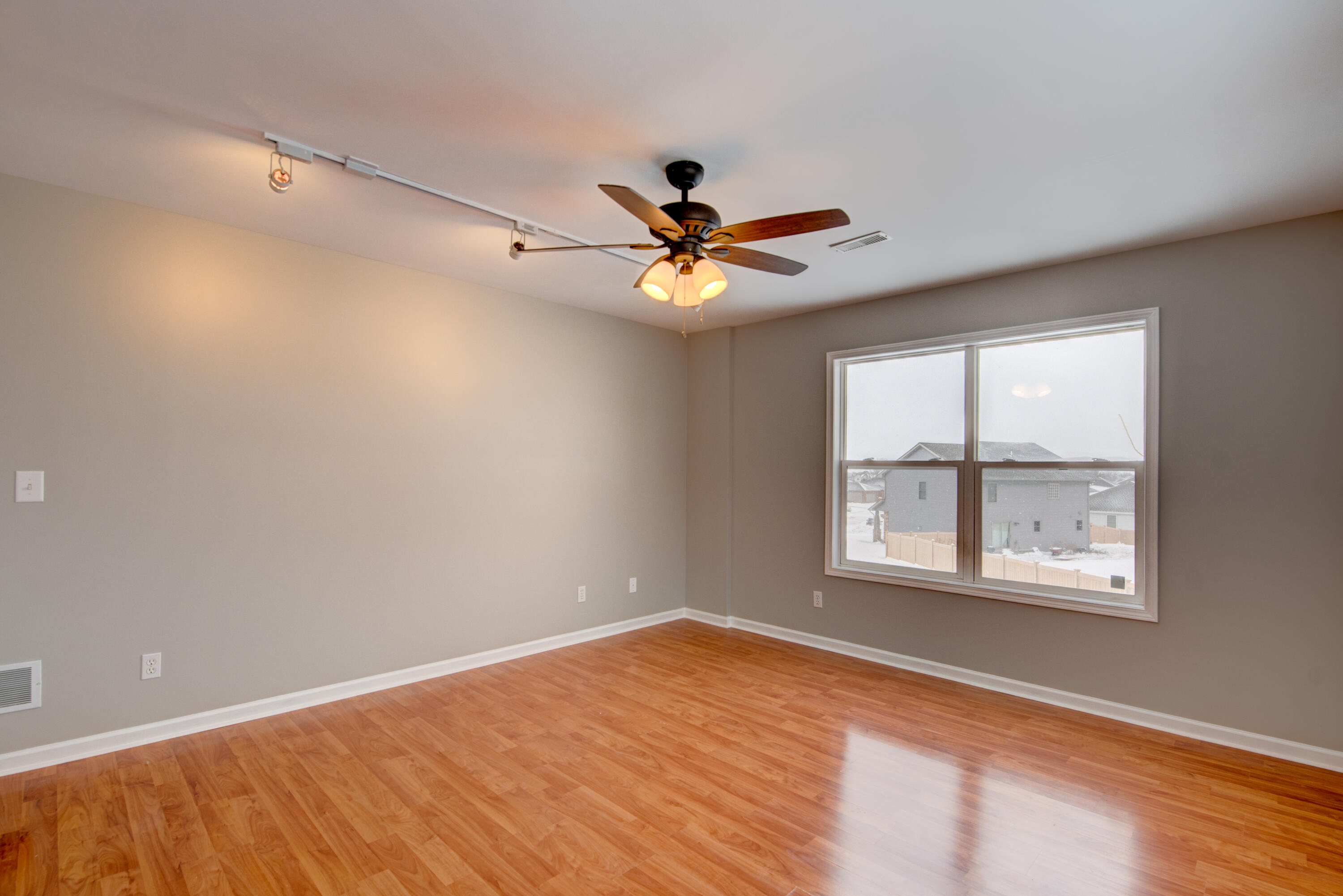 7736 East 108th Avenue, Unit C Crown Point, IN 46307 - Photo 22 of 28 a view of an empty room with a window