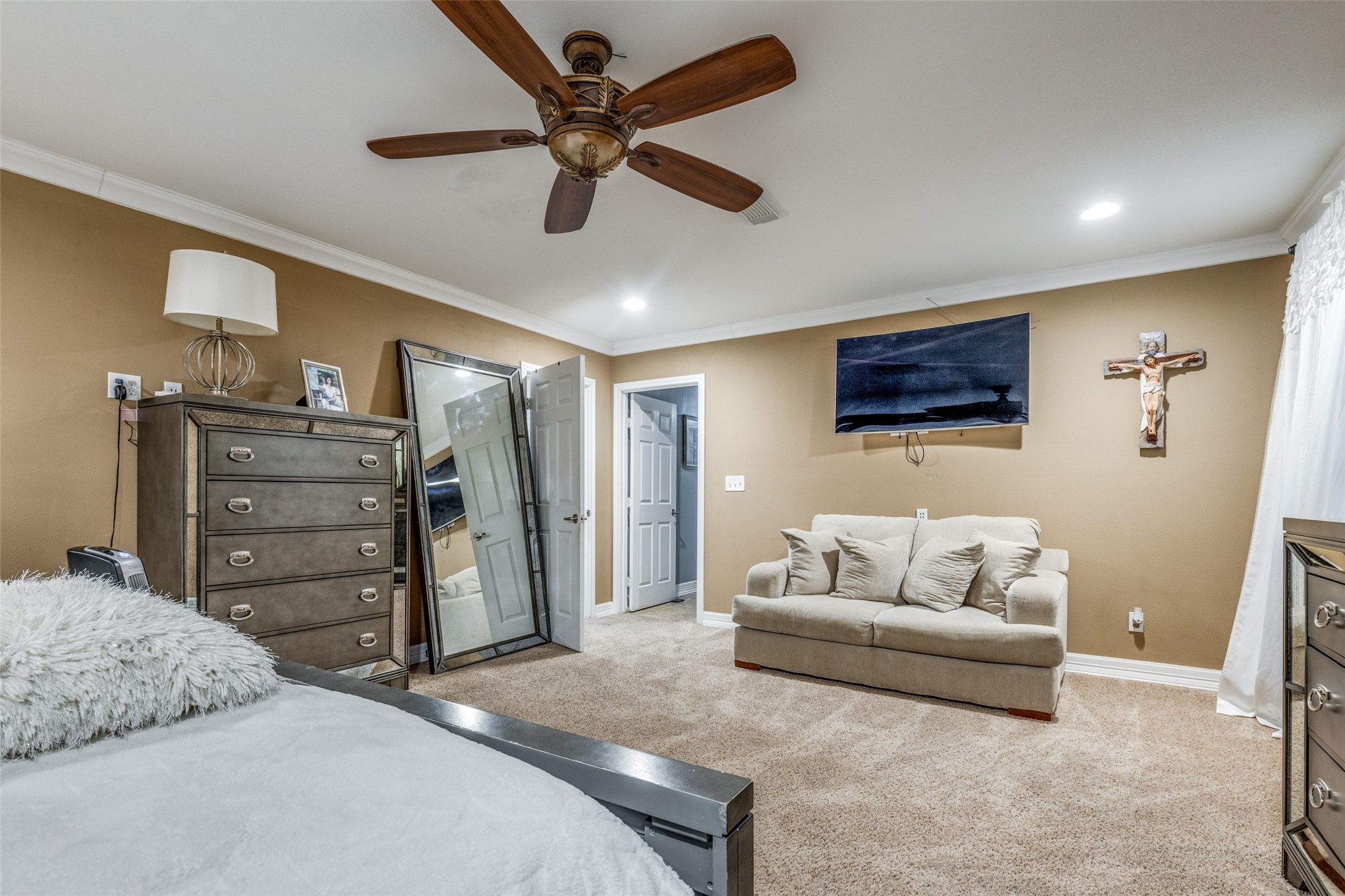 7953 Hammerly Boulevard Houston, TX 77055 - Photo 13 of 24 a spacious bedroom with a bed and furniture