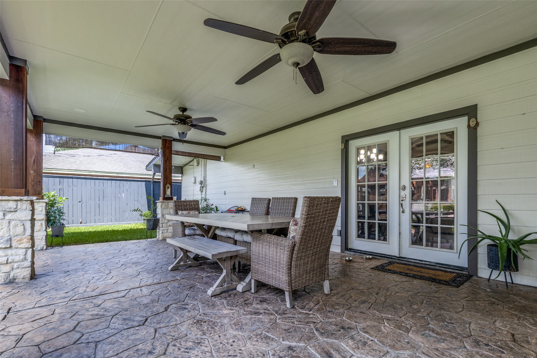 7953 Hammerly Boulevard Houston, TX 77055 - Photo 22 of 24 a dining room with furniture and a floor to ceiling window