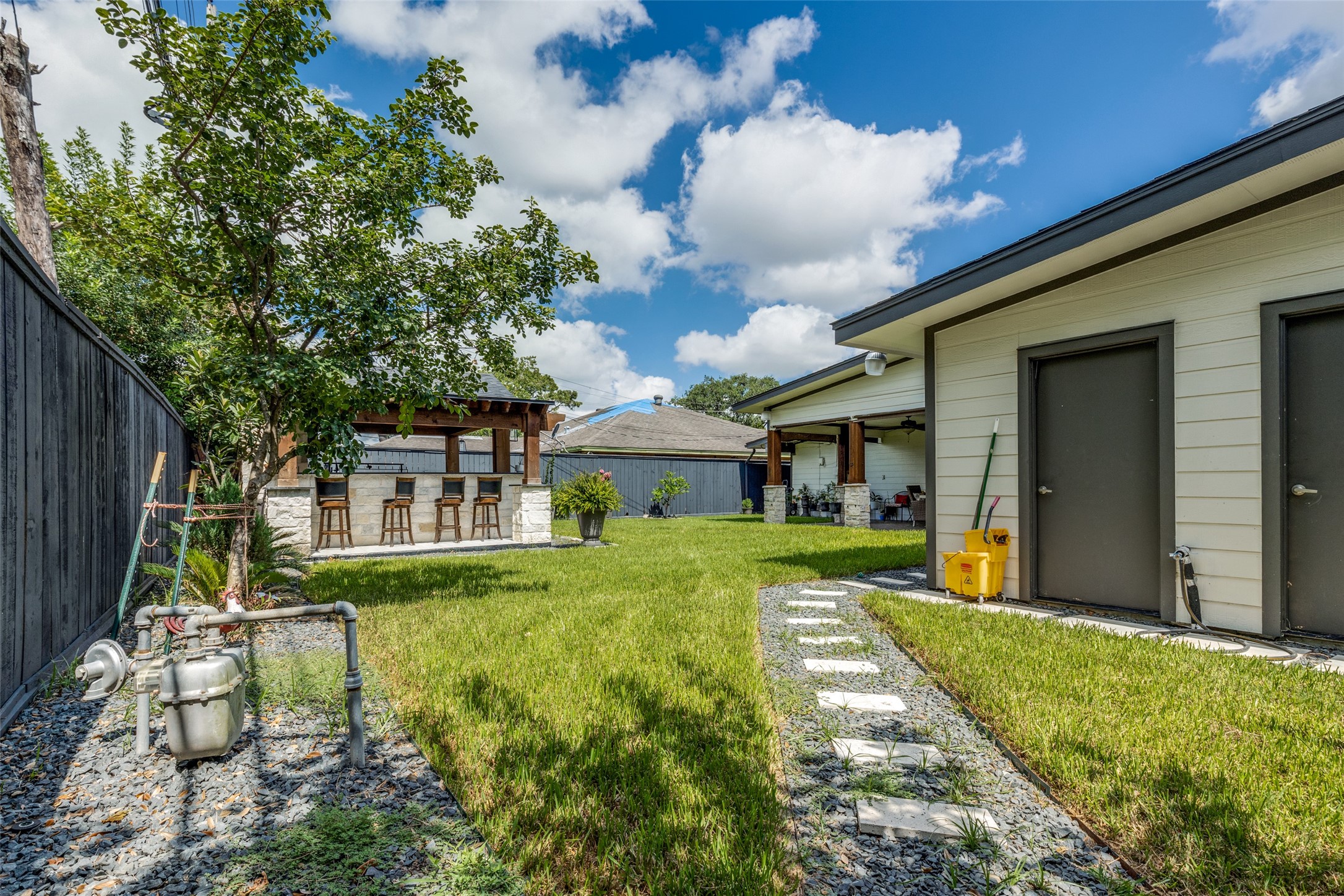 7953 Hammerly Boulevard Houston, TX 77055 - Photo 24 of 24 a front view of a house with a yard