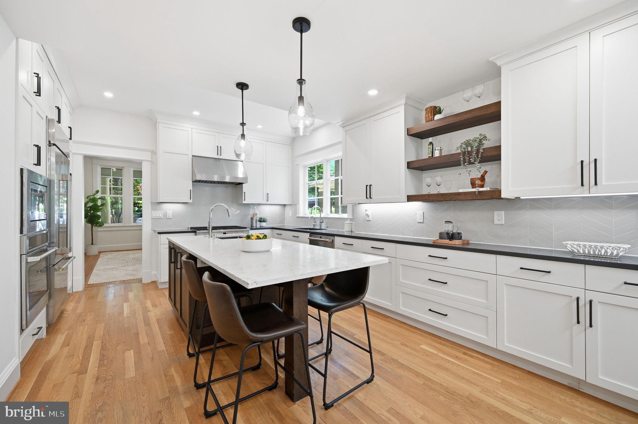3707 Military Road Northwest Washington, DC 20015 - Photo 9 of 57 Eat-in island & copious counter space and storage