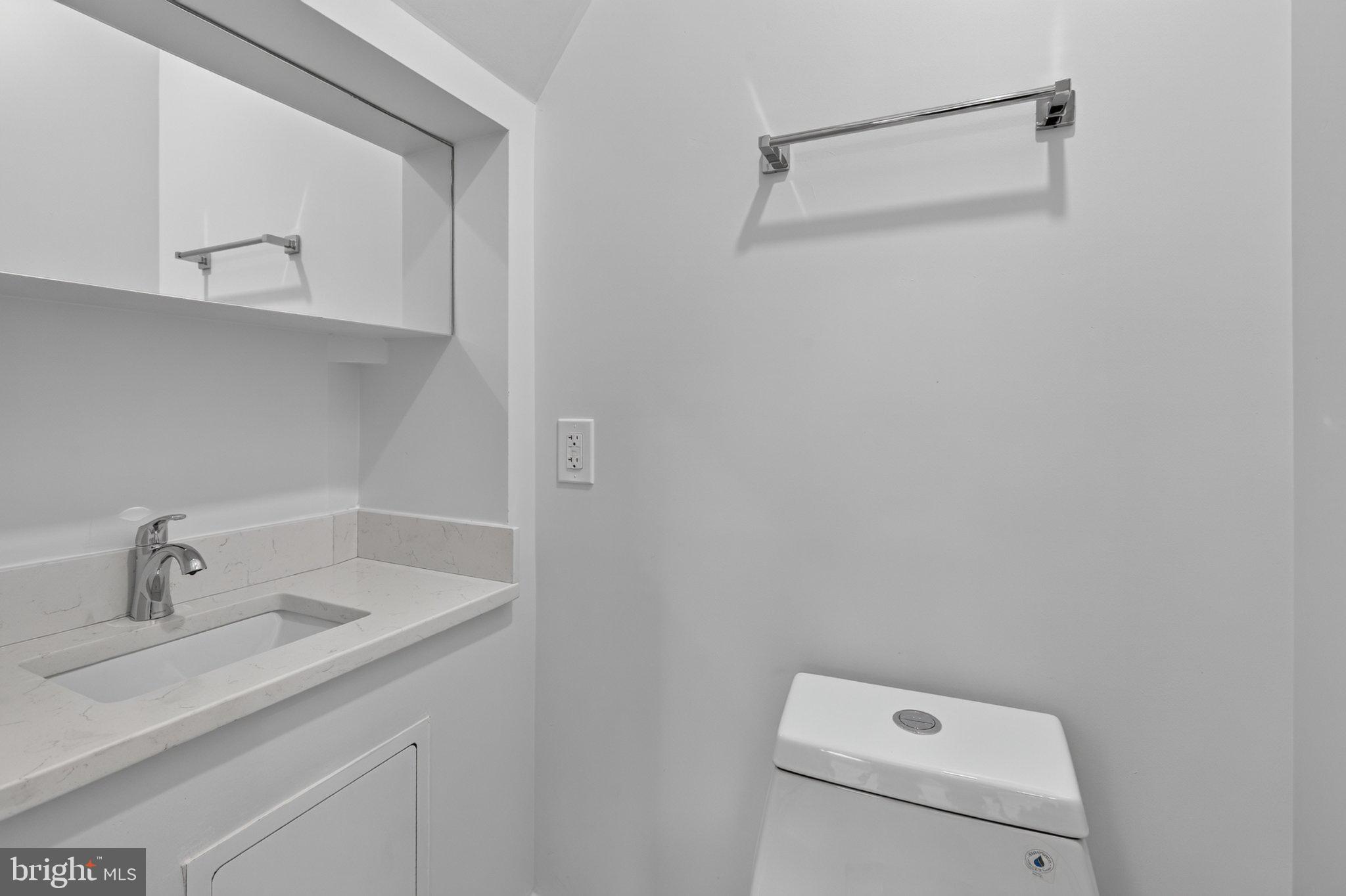 1650 Columbia Road Northwest, Unit 401 Washington, DC 20009 - Photo 7 of 21 Sleek and modern bathroom design.