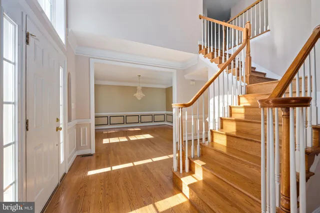 a view of a livingroom with a fireplace and window
