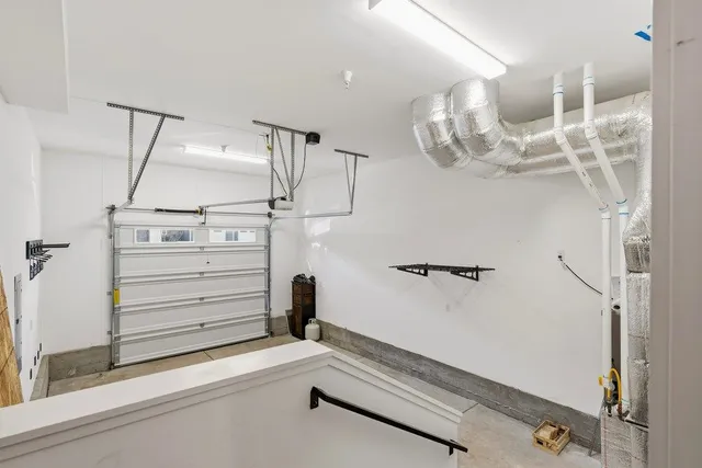 a view of a lake with a house in background