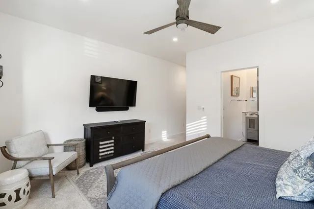 a bathroom with a mirror and a shower