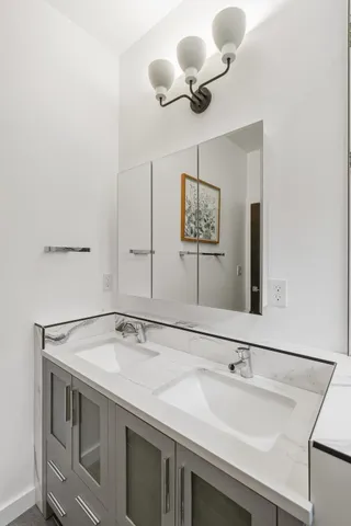 a view of a livingroom with furniture and a ceiling fan