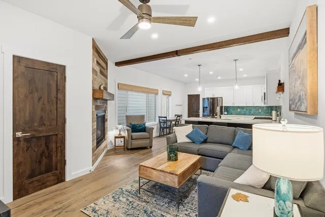 a living room with furniture and a table