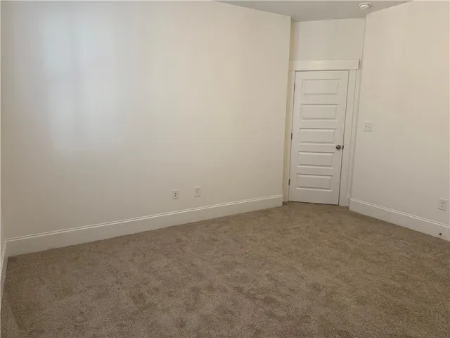 an empty room with closet