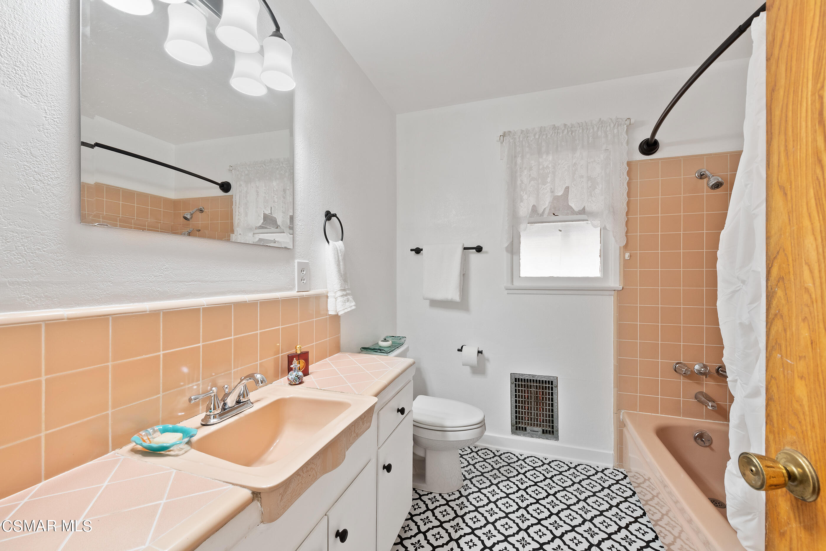 4109 Angela Street Simi Valley, CA 93063 - Photo 14 of 31 a bathroom with a sink a toilet and shower