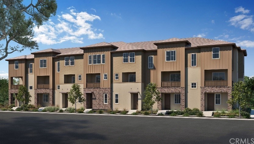 7336 Nightfall Place Rancho Cucamonga, CA 91739 - Photo 1 of 1 a front view of a building with street view