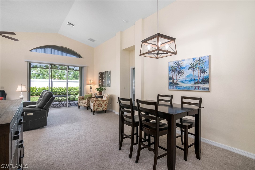 9036 Springview Loop Estero, FL 33928 - Photo 11 of 32 a view of a dining room with furniture window and outside view
