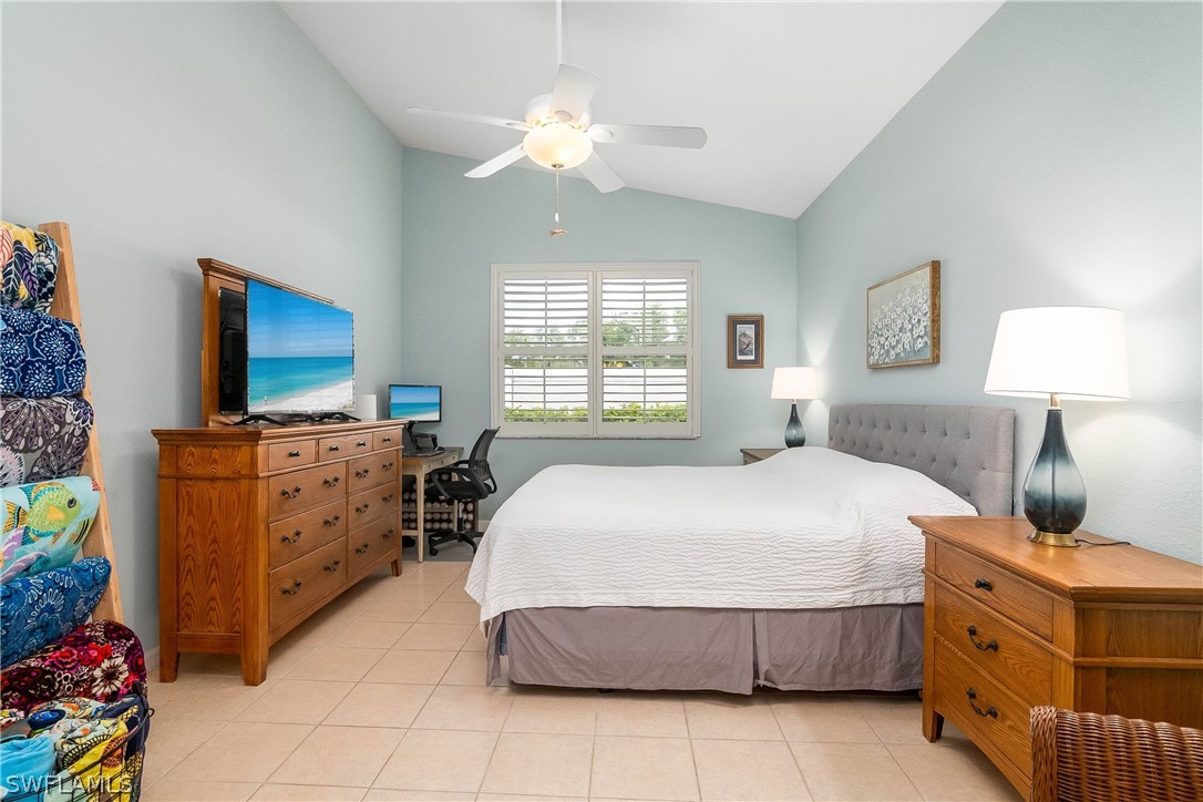 9036 Springview Loop Estero, FL 33928 - Photo 16 of 32 a bedroom with a bed dresser and a window