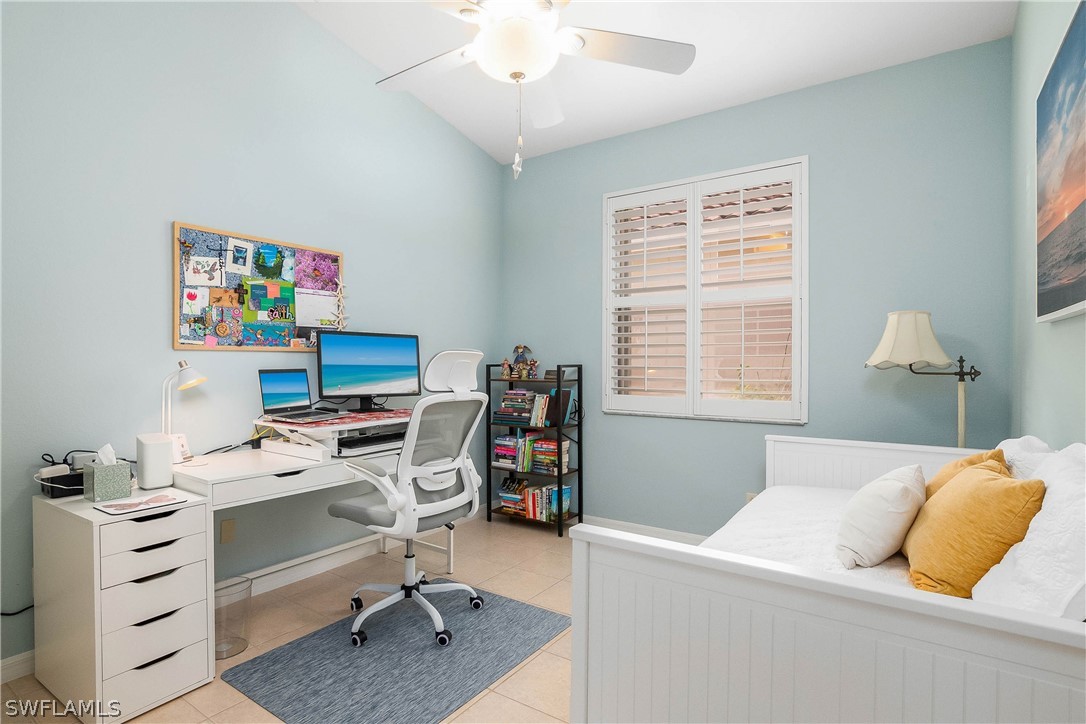 9036 Springview Loop Estero, FL 33928 - Photo 21 of 32 a bedroom with a workspace