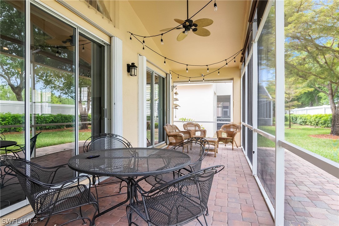 9036 Springview Loop Estero, FL 33928 - Photo 23 of 32 a view of an outdoor space with furniture and garden