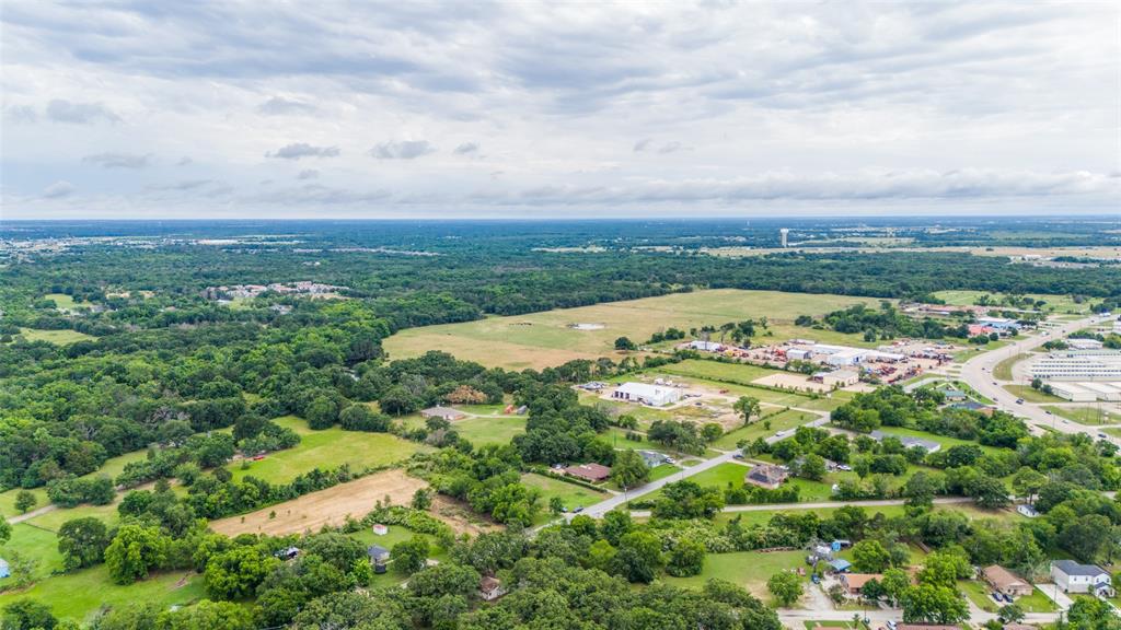 0 Williams Street Terrell, TX 75160 - Photo 4 of 5 a view of a city with lush green forest