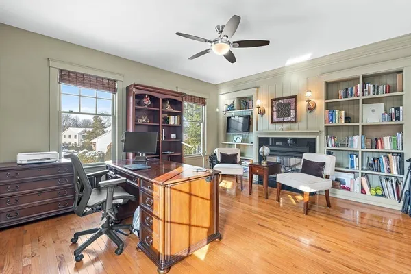 a room with furniture and a book shelf