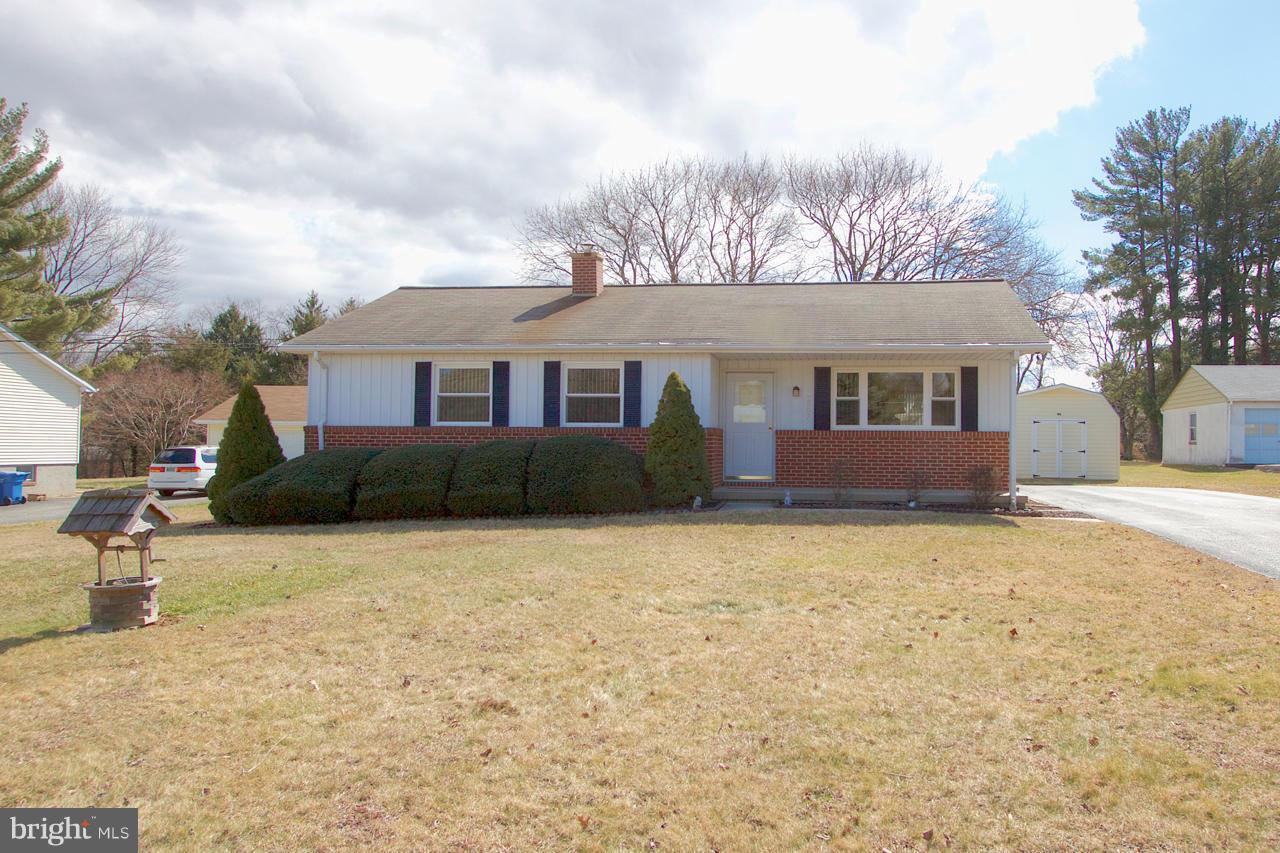2307 Mills Road Fallston, MD 21047 - Photo 1 of 30 a front view of a house with a yard and garage