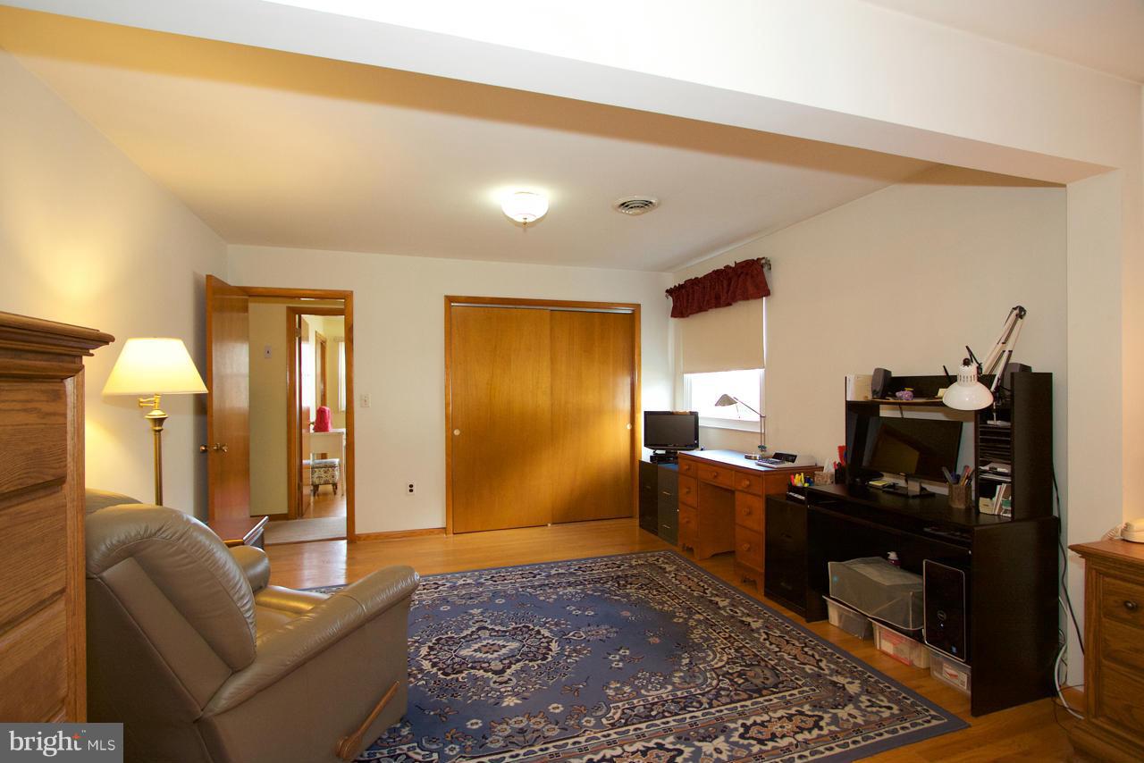 2307 Mills Road Fallston, MD 21047 - Photo 14 of 30 a living room with furniture and a rug