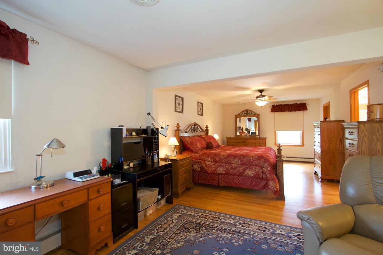 2307 Mills Road Fallston, MD 21047 - Photo 15 of 30 a living room with furniture and a flat screen tv