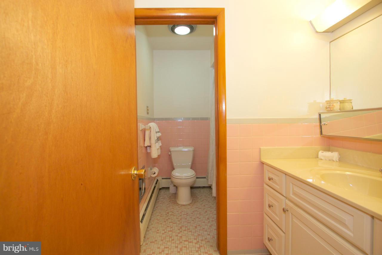 2307 Mills Road Fallston, MD 21047 - Photo 17 of 30 a bathroom with a sink and a toilet