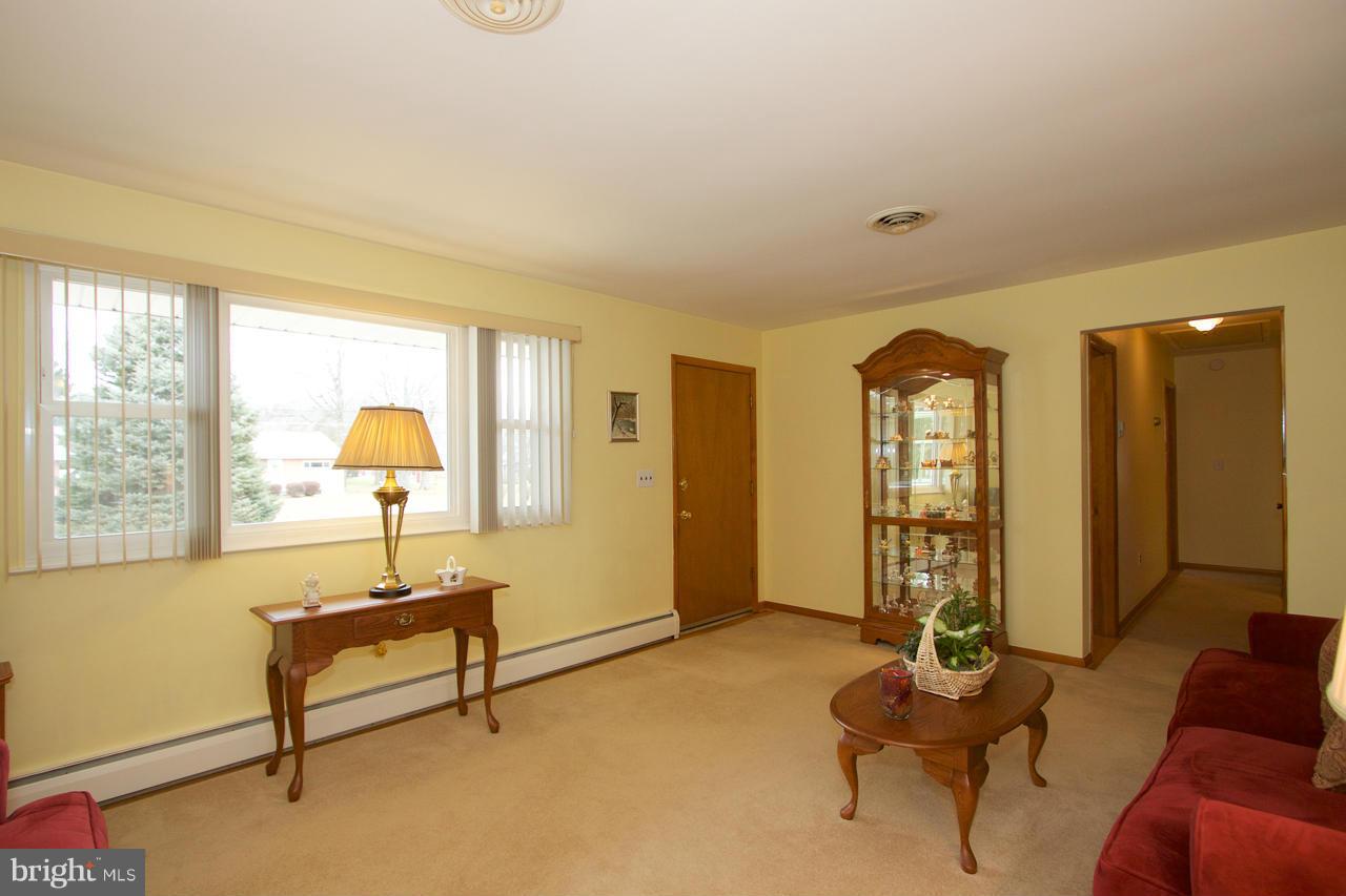 2307 Mills Road Fallston, MD 21047 - Photo 7 of 30 a living room with furniture and a potted plant