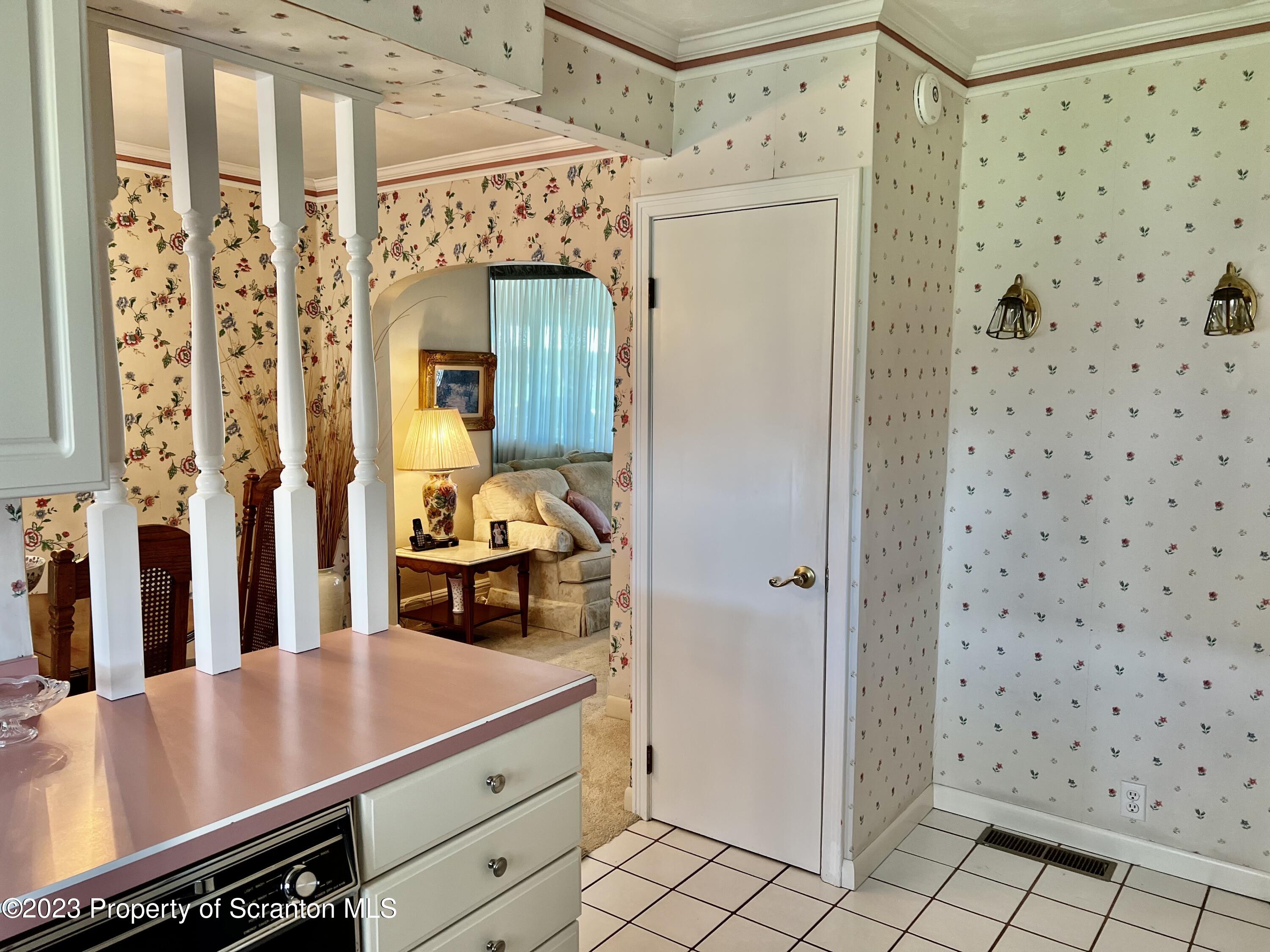 204 Moosic Road Old Forge, PA 18518 - Photo 13 of 31 a kitchen with a refrigerator and a sink