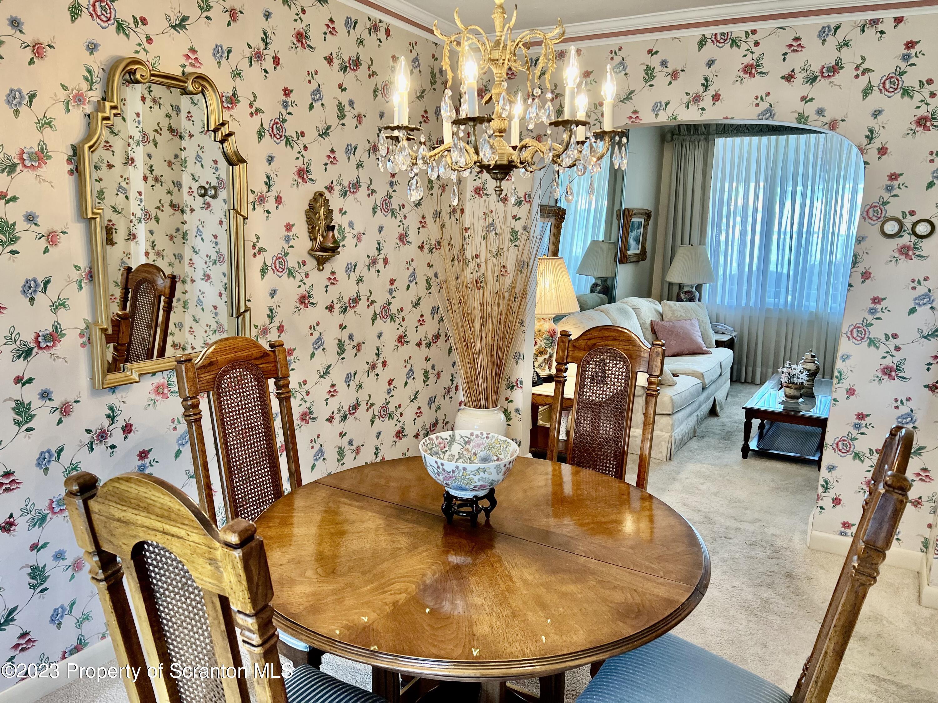204 Moosic Road Old Forge, PA 18518 - Photo 8 of 31 a dining room with furniture and wooden floor
