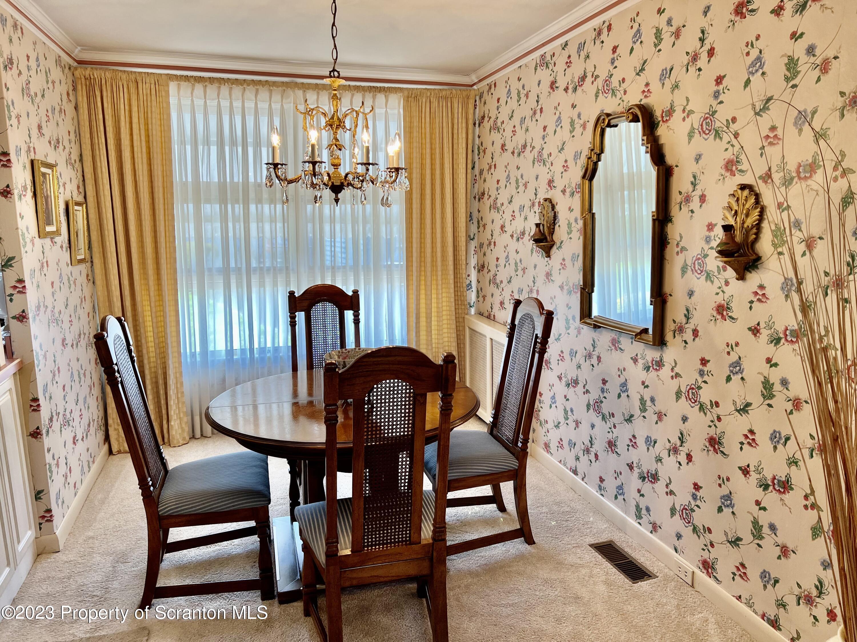 204 Moosic Road Old Forge, PA 18518 - Photo 9 of 31 a view of a dining room with furniture and window