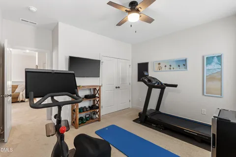 a view of workspace with gym equipment
