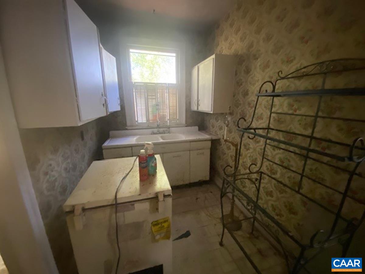 5367 James Madison Highway Fork Union, VA 23055 - Photo 11 of 11 a bathroom with a sink and a shower