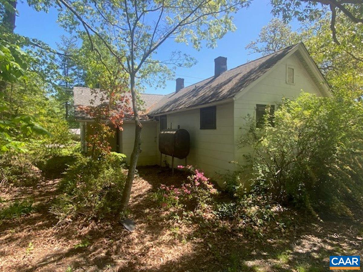 5367 James Madison Highway Fork Union, VA 23055 - Photo 2 of 11 a view of a house with a tree