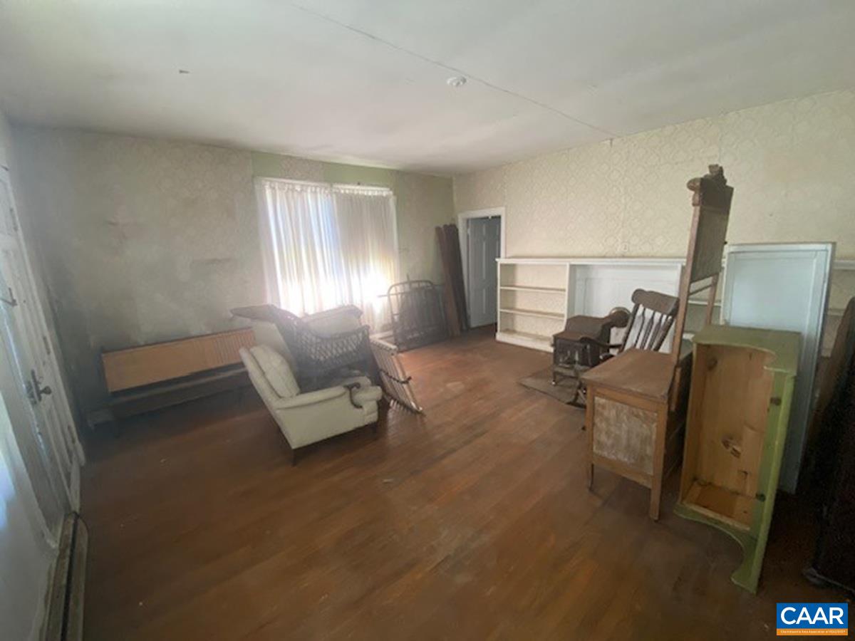 5367 James Madison Highway Fork Union, VA 23055 - Photo 4 of 11 a living room with furniture and a window