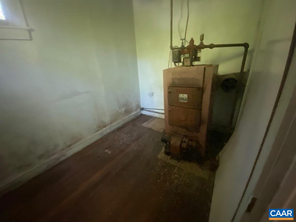 5367 James Madison Highway Fork Union, VA 23055 - Photo 8 of 11 a bathroom with a sink and vanity