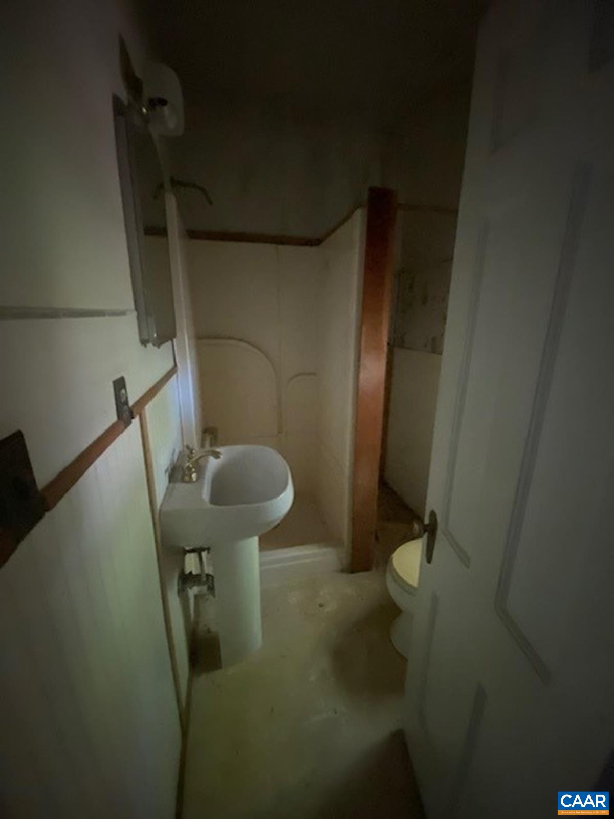 5367 James Madison Highway Fork Union, VA 23055 - Photo 10 of 11 a bathroom with a sink and a mirror