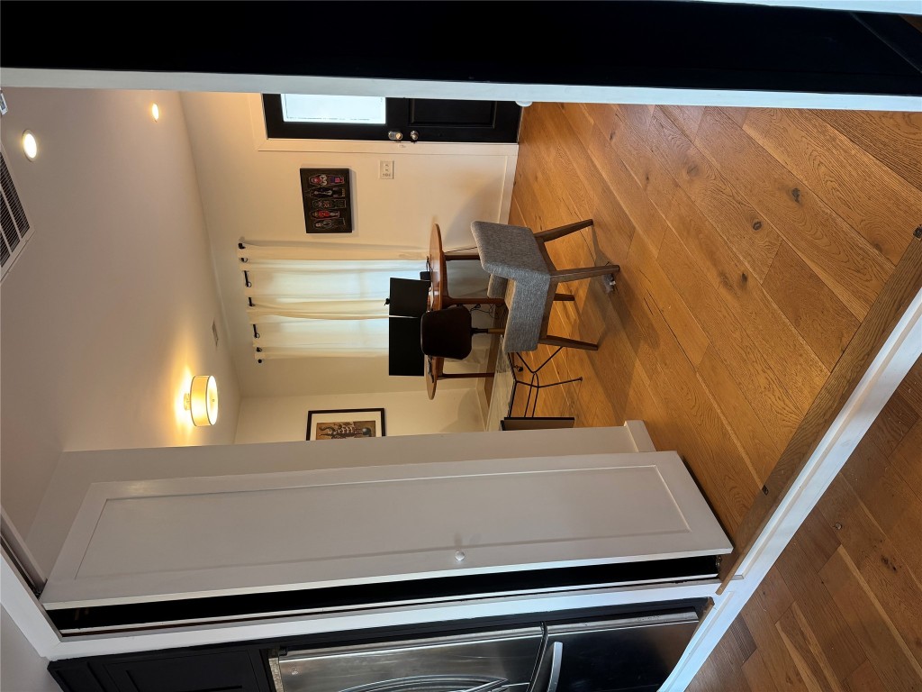 2109 Riverview Street, Unit A Austin, TX 78702 - Photo 11 of 32 a workspace with furniture and a window