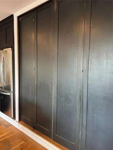 a bathroom with a shower and a sink